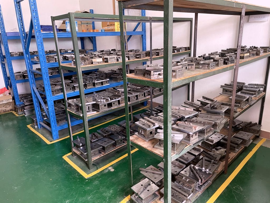 In-house overmold tooling shelves in the Shenzhen mold shop