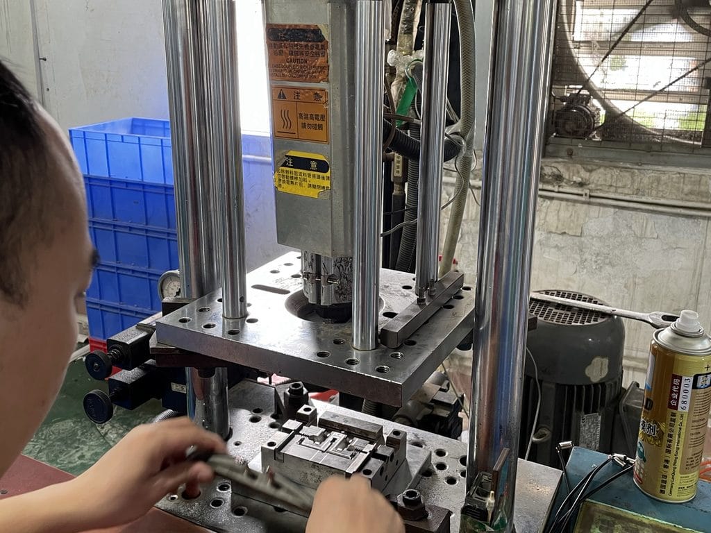 Overmolding workstation producing custom overmolded cable assemblies